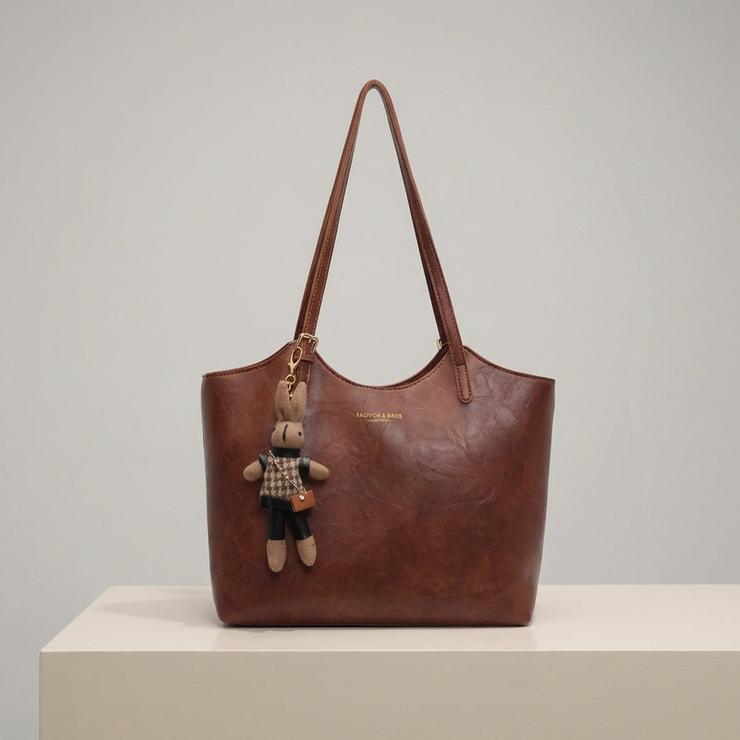 Women's Soft Vegan Leather Shoulder Bag with Bunny Charm in Brown
